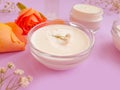 Cream cosmetic rose ingredients accessories ointment ingredients moisturizing therapy flower on colored fresh d