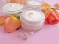 Cream cosmetic rose ingredients moisturizing ingredients moisturizing therapy flower on colored fresh d