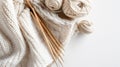 Cream knitted scarf with bamboo knitting needles and wool yarn balls Royalty Free Stock Photo