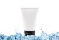 Cream with moisturising effect in white bottle with copy space in water splash Royalty Free Stock Photo