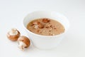 Cream mushroom soup in white ceramic bowl