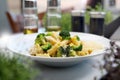 Cream penne pasta with broccoli, cream and cheese. Italy dish with chicken. Mediterranean cuisine, selective focus. Royalty Free Stock Photo