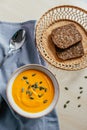 Cream of Pumpkin Soup with toasted bread and pumpkin seeds. Healthy homemade food. Natural food. Vegan diet.