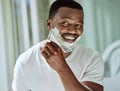 Cream, razor and shaving black man in the bathroom for skincare, beard grooming routine and facial care. Smile
