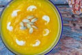 Cream of roasted pumpkin spicy soup traditional simple vegetarian autumn vegetable healthy organic diet homemade food meal on