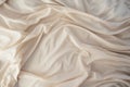 Cream satin fabric texture with soft waves