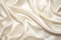 cream satin grouped in broad, soft folds