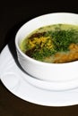 Cream soup with croutons lentils and pumpkin, dill on white bowl Royalty Free Stock Photo