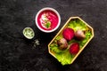 Cream soup made of red beet with raw beet roots Royalty Free Stock Photo