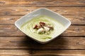 Cream spinach soup with bacon and feta cheese Royalty Free Stock Photo