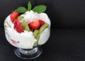 Cream with strawberries and KIWI Royalty Free Stock Photo