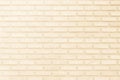 Cream and white brick wall texture background. Brickwork or stonework flooring interior rock old pattern clean concrete grid Royalty Free Stock Photo