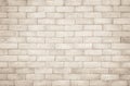 Cream and white brick wall texture background. Brickwork and stonework flooring interior rock old pattern clean concrete grid Royalty Free Stock Photo