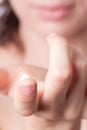 Cream on the women hand Royalty Free Stock Photo