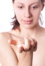 Cream on the women hand Royalty Free Stock Photo