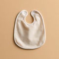 CreamColored Baby Bib Simple Elegance for Mealtime Royalty Free Stock Photo