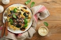 Creamy Alfredo pasta. Italian pasta fettuccini with mushrooms, chicken meat, spinach, basil and cream sauce on old rustic table Royalty Free Stock Photo