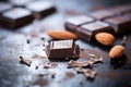 creamy almond butter on dark chocolate square, macro shot