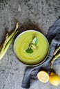 Creamy asparagus and spinach soup in a ceramic plate Royalty Free Stock Photo