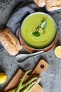 Creamy asparagus and spinach soup in a ceramic plate Royalty Free Stock Photo