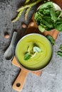 Creamy asparagus and spinach soup in a ceramic plate Royalty Free Stock Photo