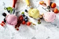 Creamy berry and nut ice cream flavours Royalty Free Stock Photo