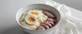 A creamy bowl of silky tofu with century egg and pork. Royalty Free Stock Photo