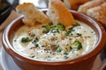 A creamy bowl of stilton and broccoli soup with crusty bread. Royalty Free Stock Photo
