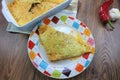 Creamy cheesy tortilla baked dish with ground meat and mozzarella cheese for a family dinner