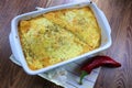 Creamy cheesy tortilla baked dish with ground meat and mozzarella cheese for a family dinner