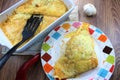 Creamy cheesy tortilla baked dish with ground meat and mozzarella cheese for a family dinner