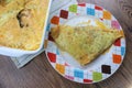 Creamy cheesy tortilla baked dish with ground meat and mozzarella cheese for a family dinner