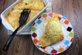 Creamy cheesy tortilla baked dish with ground meat and mozzarella cheese for a family dinner