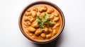Creamy chickpea curry in a bowl, topped with fresh herbs Royalty Free Stock Photo