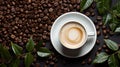 creamy coffee cup and coffee beans as the backdrop, offering a delicious and aromatic experience. Royalty Free Stock Photo