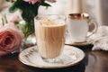 Creamy coffee in a glass, a delicious morning treat