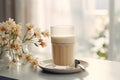 Creamy coffee in a glass, a delicious morning treat