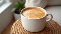 Creamy coffee in a white mug Royalty Free Stock Photo