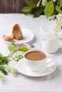 Creamy Coffee in white mug with apple blossom Royalty Free Stock Photo