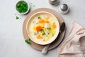 Creamy fish chowder soup in bowl on concrete background Royalty Free Stock Photo