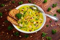 Creamy fish Salmon, leek, potato soup on wooden background