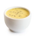 Creamy herb dressing in white ceramic condiment bowl isolated on Royalty Free Stock Photo