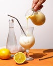 Creamy lemonade trendy summer mocktail. Cold non-alcoholic cocktail with lemon juice and sweetened condensed milk