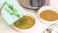 Creamy lentil soup close up on kitchen table. Royalty Free Stock Photo