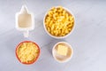 Creamy mac and cheese with ingredients for cooking Royalty Free Stock Photo