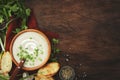 Creamy Mushroom Soup with croutons, spices and chives on rustic wooden table background Royalty Free Stock Photo