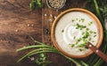 Creamy Mushroom Soup with croutons, spices and chives on rustic wooden table background Royalty Free Stock Photo