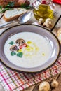 Creamy Mushroom Soup on rustic wooden table Royalty Free Stock Photo