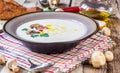 Creamy Mushroom Soup on rustic wooden table Royalty Free Stock Photo