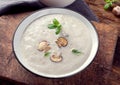 Creamy Mushroom Soup on rustic wooden table Royalty Free Stock Photo